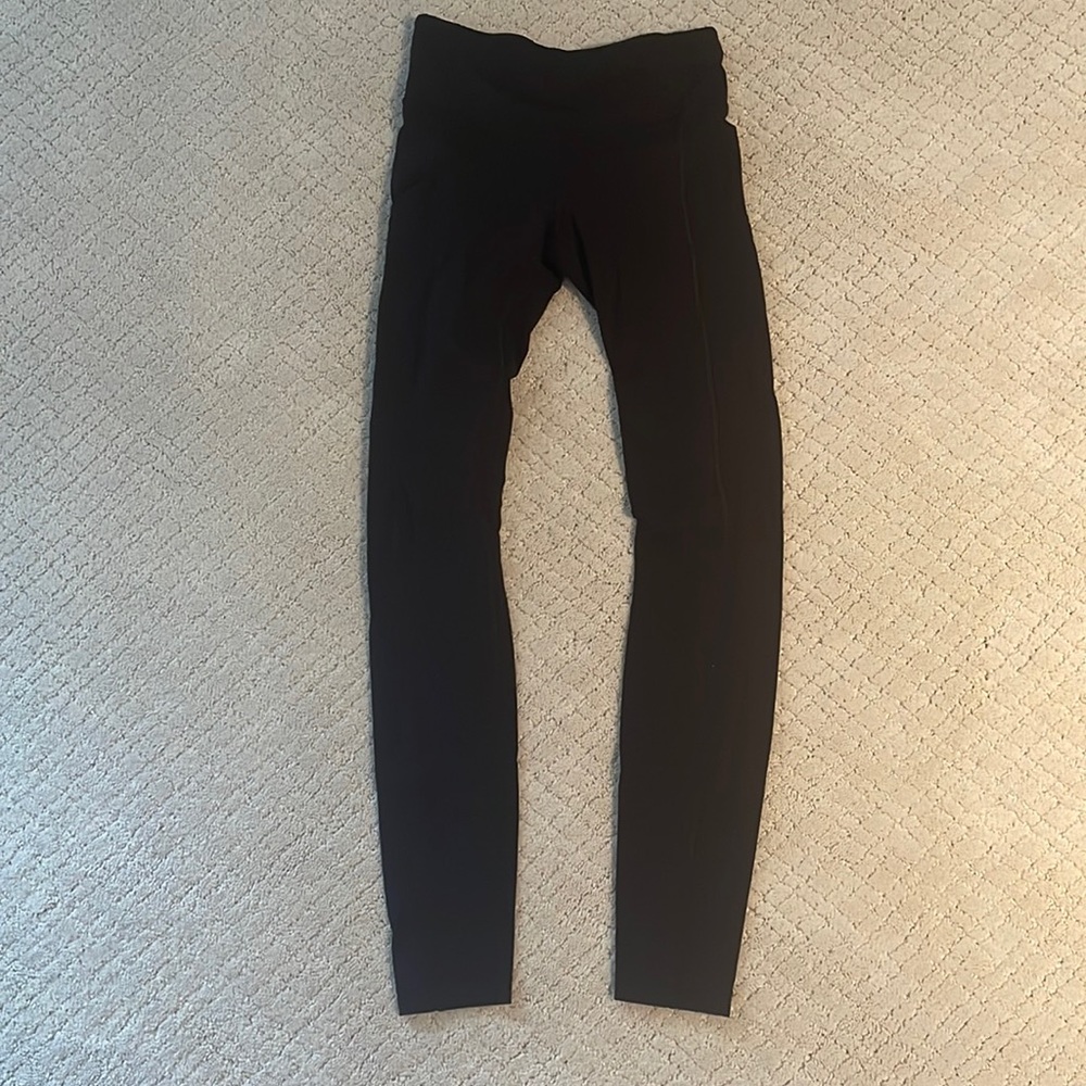 Lululemon leggings with side pockets and zipper back pocket (Size 2)